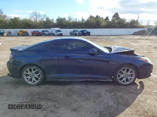 2008 Hyundai Tiburon GT z VIN KMHHN66F88U278938, wystawiony jako IAAI lot #41490527 z przebiegiem 200 669 mil mil oraz . Historia ofert i sprzedaży dostępna na DreamBid. Obrazek 13.