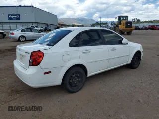 2006 Suzuki Forenza z VIN KL5JD56Z86K350488, wystawiony jako Copart lot #67422784 z przebiegiem 125 251 mil mil oraz Tytuł czysty. Historia ofert i sprzedaży dostępna na DreamBid. Obrazek 3.