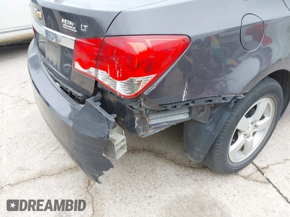 2015 Chevrolet Cruze LT with VIN 1G1PC5SB1F7299766, listed as a IAAI auction lot 42174921 with 131,308 mi miles and . Bid and sale history available at DreamBid. Image 13.