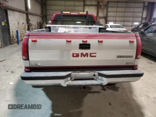 1991 GMC Sierra 1500 with VIN 2GTHC39K2M1538208, listed as a Copart auction lot 41664305 with 56,293 mi miles and Salvage Title. Bid and sale history available at DreamBid. Image 6.
