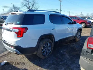 2020 GMC Acadia SLT with VIN 1GKKNMLS4LZ136098, listed as a IAAI auction lot 41618272 with 100,486 mi miles and . Bid and sale history available at DreamBid. Image 4.