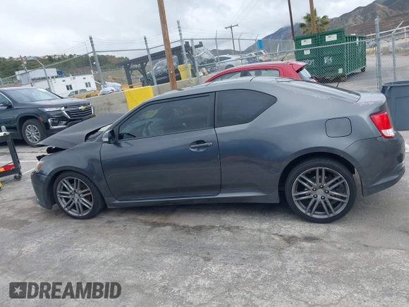 2013 Scion tC with VIN JTKJF5C74D3052964, listed as a IAAI auction lot 41804627 with 244,013 mi miles. Bid and sale history available at carsss.com. Image 14.