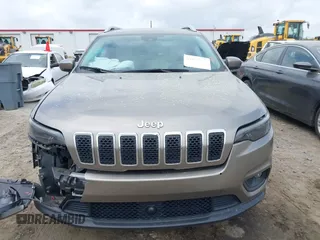 2021 Jeep Cherokee Altitude z VIN 1C4PJLLB8MD164590, wystawiony jako IAAI lot #41919423 z przebiegiem 29 672 mil mil oraz . Historia ofert i sprzedaży dostępna na DreamBid. Obrazek 12.