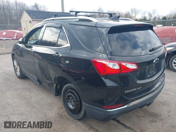 2018 Chevrolet Equinox Premier with VIN 2GNAXWEX6J6302935, listed as a IAAI auction lot 42065883 with 61,983 mi miles and . Bid and sale history available at carsss.com. Image 3.