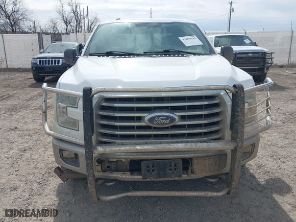 2015 Ford F-150 XLT w/HD Payload Pkg with VIN 1FTFW1EF3FFB70225, listed as a IAAI auction lot 41890185 with 169,564 mi miles. Bid and sale history available at carsss.com. Image 6.