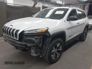 2015 Jeep Cherokee Trailhawk with VIN 1C4PJMBS1FW665500, listed as a IAAI auction lot 42068268 with 127,246 mi miles. Bid and sale history available at carsss.com. Image 18.