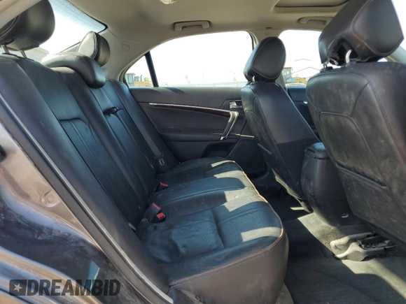 2012 Lincoln MKZ Hybrid z VIN 3LNDL2L33CR812788, wystawiony jako Copart lot #61068125 z przebiegiem 246 016 mil mil oraz Szkoda całkowita • Salvage title. Historia ofert i sprzedaży dostępna na DreamBid. Obrazek 10.