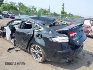 2019 Ford Fusion Titanium with VIN 3FA6P0D92KR247270, listed as a IAAI auction lot 42474803 with Not provided miles and . Bid and sale history available at DreamBid. Image 3.