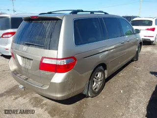 2005 Honda Odyssey EX-L with VIN 5FNRL387X5B122844, listed as a IAAI auction lot 41659620 with 278,163 mi miles. Bid and sale history available at carsss.com. Image 4.