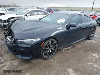 2021 BMW 8 Series M850i with VIN WBAGV8C03MCG68700, listed as a IAAI auction lot 41684696 with 18,516 mi miles. Bid and sale history available at carsss.com. Image 2.