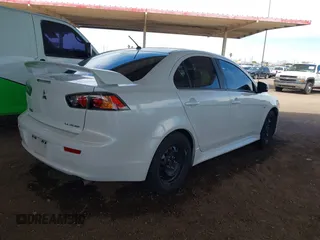2016 Mitsubishi Lancer ES with VIN JA32U2FU6GU009743, listed as a IAAI auction lot 42088471 with 149,639 mi miles. Bid and sale history available at carsss.com. Image 4.