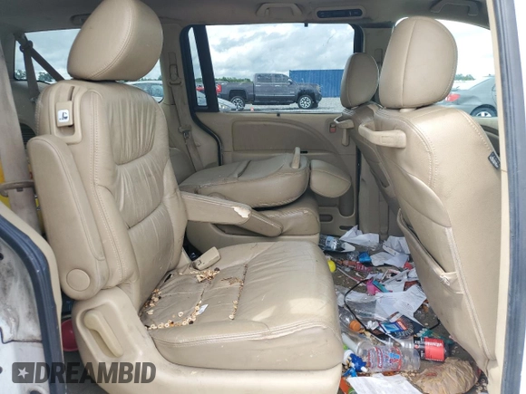 2010 Honda Odyssey EX-L с VIN 5FNRL3H67AB045013, выставлен на аукционе Copart как лот 56686655 с пробегом 231 515 миль миль и Чистый • Clean title. История ставок и продаж доступна на DreamBid. Изображение 10.