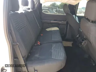 2021 Ford F-150 XL с VIN 1FTEW1EP5MFC69145, выставлен на аукционе Copart как лот 58179155 с пробегом 69 097 миль миль и Списание • Salvage title. История ставок и продаж доступна на DreamBid. Изображение 10.