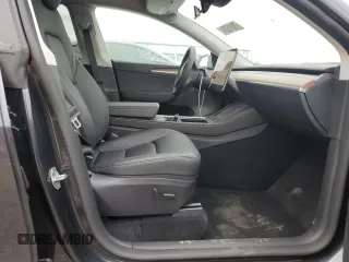 2024 Tesla Model Y Long Range z VIN 7SAYGDEE3RF087162, wystawiony jako Copart lot #79315224 z przebiegiem 3 232 mil mil oraz Szkoda całkowita • Salvage title. Historia ofert i sprzedaży dostępna na DreamBid. Obrazek 7.