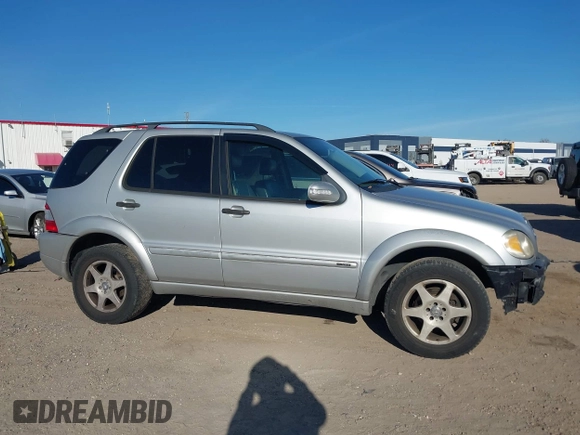 2003 Mercedes-Benz M-Class 3.2L with VIN 4JGAB54E03A383496, listed as a IAAI auction lot 41327756 with 162,973 mi miles. Bid and sale history available at carsss.com. Image 13.