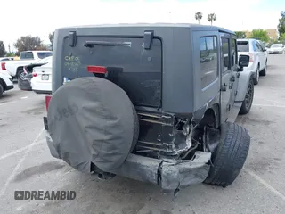 2007 Jeep Wrangler Unlimited X with VIN 1J4GB391X7L172965, listed as a IAAI auction lot 42040337 with 170,482 mi miles and . Bid and sale history available at DreamBid. Image 4.
