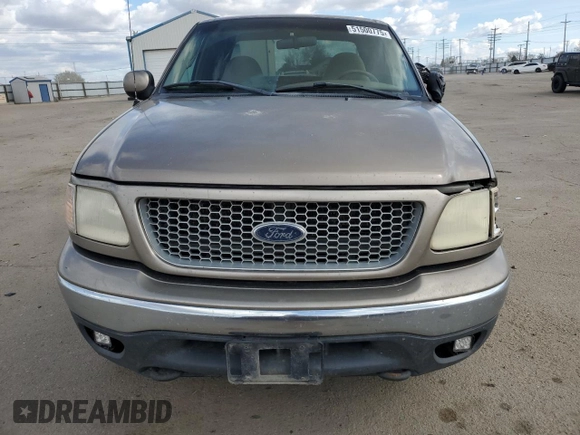 2001 Ford F-150 XL with VIN 1FTRX18L01KE64063, listed as a Copart auction lot 51500775 with 326,070 mi miles and Salvage title. Bid and sale history available at DreamBid. Image 5.
