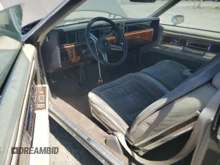 1983 Oldsmobile Toronado with VIN 1G3AZ57Y8DE312949, listed as a Copart auction lot 65228244 with 159,172 mi miles and Salvage Title. Bid and sale history available at DreamBid. Image 8.