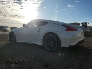 2016 Nissan 370Z z VIN JN1AZ4EH2GM935381, wystawiony jako Copart lot #83220624 z przebiegiem 56 907 mil mil oraz Szkoda całkowita • Salvage title. Historia ofert i sprzedaży dostępna na DreamBid. Obrazek 2.