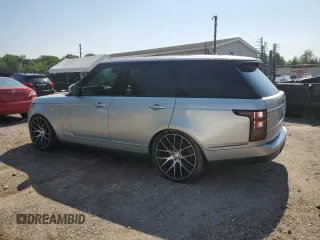 2014 Land Rover Range Rover HSE with VIN SALGS2WF1EA164710, listed as a Copart auction lot 62703505 with 138,163 mi miles and Salvage title. Bid and sale history available at DreamBid. Image 2.