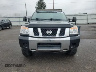 2014 Nissan Titan Pro-4X with VIN 1N6AA0EC3EN514744, listed as a Copart auction lot 80469314 with 191,780 mi miles and Salvage title. Bid and sale history available at DreamBid. Image 5.