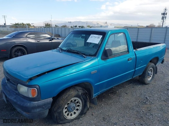 1995 Mazda B-Series 2WD Truck with VIN 4F4CR12A0STM09915, listed as a IAAI auction lot 41773728 with NaN miles. Bid and sale history available at carsss.com. Image 2.