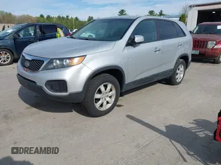 2011 Kia Sorento LX with VIN 5XYKT3A12BG160242, listed as a IAAI auction lot 42220874 with 142,298 mi miles and . Bid and sale history available at carsss.com. Image 2.