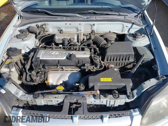2004 Hyundai Accent GL with VIN KMHCG45C14U547954, listed as a IAAI auction lot 41350219 with 138,436 mi miles. Bid and sale history available at carsss.com. Image 10.