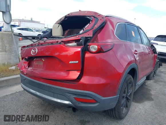 2016 Mazda CX-9 Grand Touring with VIN JM3TCADY0G0107481, listed as a IAAI auction lot 42043612 with Not Provided miles and . Bid and sale history available at DreamBid. Image 4.