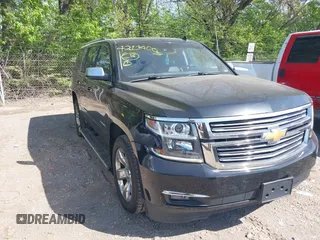 2015 Chevrolet Tahoe LTZ z VIN 1GNSKCKC8FR141163, wystawiony jako IAAI lot #42388016 z przebiegiem 221 804 mil mil oraz . Historia ofert i sprzedaży dostępna na DreamBid. Obrazek 1.