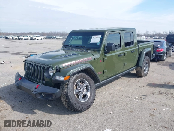 2023 Jeep Gladiator Rubicon with VIN 1C6JJTBGXPL586154, listed as a IAAI auction lot 41370352 with 11,207 mi miles and . Bid and sale history available at DreamBid. Image 17.