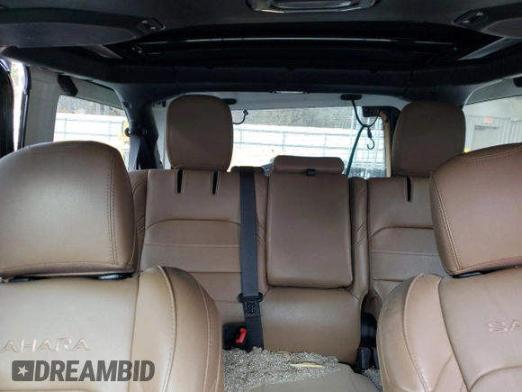 2023 Jeep Wrangler Sahara with VIN 1C4JJXP62PW553101, listed as a Copart auction lot 85543124 with 28,157 mi miles and Salvage Title. Bid and sale history available at DreamBid. Image 10.