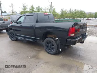 2014 Ram 2500 SLT with VIN 3C6TR5DT5EG248078, listed as a IAAI auction lot 41954325 with 69,033 mi miles. Bid and sale history available at carsss.com. Image 3.