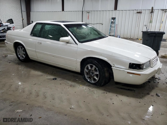 2001 Cadillac Eldorado Touring ETC with VIN 1G6ET12981B108521, listed as a Copart auction lot 84194674 with 0 mi miles and Salvage Title. Bid and sale history available at carsss.com. Image 4.