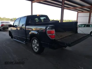 2014 Ford F-150 XL with VIN 1FTFW1CF9EKF87745, listed as a IAAI auction lot 42026883 with 221,307 mi miles. Bid and sale history available at carsss.com. Image 3.
