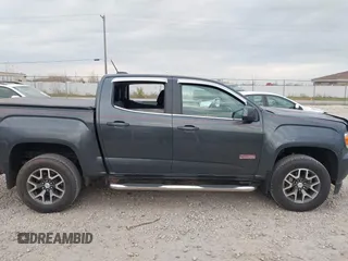 2016 GMC Canyon 4WD SLE with VIN 1GTG6CE38G1165896, listed as a IAAI auction lot 40716621 with 116,684 mi miles. Bid and sale history available at carsss.com. Image 13.