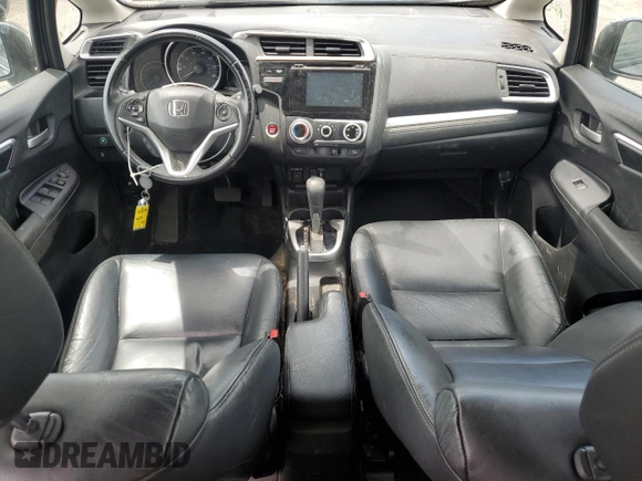2015 Honda Fit EX-L z VIN 3HGGK5H8XFM776885, wystawiony jako Copart lot #57298225 z przebiegiem Nie podano mil oraz Szkoda całkowita • Salvage title. Historia ofert i sprzedaży dostępna na DreamBid. Obrazek 8.