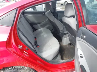 2015 Hyundai Accent GLS with VIN KMHCT4AE0FU923503, listed as a IAAI auction lot 41971073 with 140,886 mi miles. Bid and sale history available at carsss.com. Image 8.
