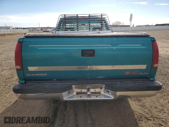 1994 GMC Sierra 1500 with VIN 1GTEK14K5RE539652, listed as a Copart auction lot 80877094 with 162,533 mi miles and Salvage Title. Bid and sale history available at DreamBid. Image 6.