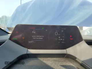 2023 Toyota Prius LE z VIN JTDACAAU8P3000694, wystawiony jako Copart lot #63066504 z przebiegiem 34 371 mil mil oraz Szkoda całkowita • Salvage title. Historia ofert i sprzedaży dostępna na DreamBid. Obrazek 9.