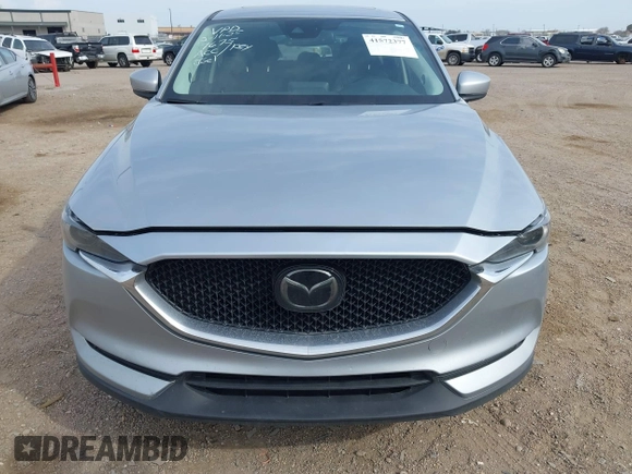 2017 Mazda CX-5 Grand Touring with VIN JM3KFBDL8H0227348, listed as a IAAI auction lot 41572377 with 124,908 mi miles. Bid and sale history available at carsss.com. Image 12.