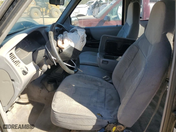 1995 Ford Ranger Splash with VIN 1FTCR14X2STA61772, listed as a Copart auction lot 77033104 with 129,784 mi miles and Salvage Title. Bid and sale history available at carsss.com. Image 7.