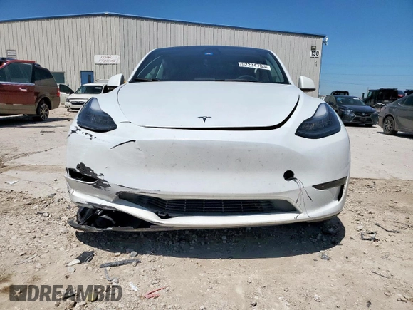 2023 Tesla Model Y Long Range z VIN 7SAYGDEE1PA155629, wystawiony jako Copart lot #52234735 z przebiegiem 24 944 mil mil oraz Szkoda całkowita • Salvage title. Historia ofert i sprzedaży dostępna na DreamBid. Obrazek 5.