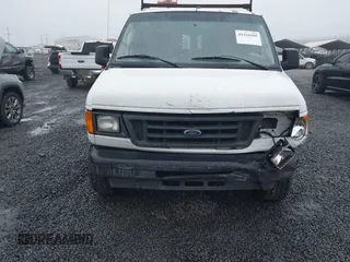 2005 Ford Econoline Cargo with VIN 1FTNE24L75HA61605, listed as a IAAI auction lot 41344105 with 156,726 mi miles. Bid and sale history available at carsss.com. Image 12.