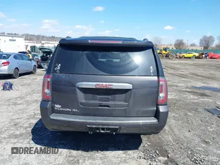 2015 GMC Yukon XL Denali with VIN 1GKS2JKJ5FR144991, listed as a IAAI auction lot 41877853 with 167,814 mi miles. Bid and sale history available at carsss.com. Image 17.