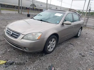 2003 Nissan Altima S with VIN 1N4AL11D33C252059, listed as a IAAI auction lot 42079201 with 152,510 mi miles. Bid and sale history available at carsss.com. Image 2.