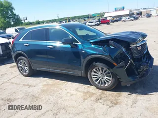 2025 Cadillac XT4 FWD Premium Luxury z VIN 1GYFZCR47SF146106, wystawiony jako IAAI lot #42324320 z przebiegiem 4 601 mil mil oraz . Historia ofert i sprzedaży dostępna na DreamBid. Obrazek 13.