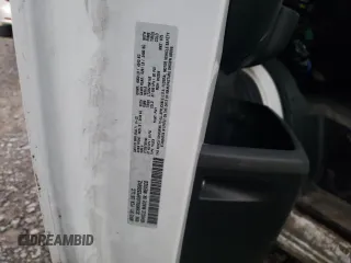 2023 Ram ProMaster Cargo with VIN 3C6MRVJG6PE506912, listed as a Copart auction lot 82334984 with Not Provided miles and Salvage Title. Bid and sale history available at DreamBid. Image 12.