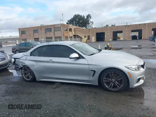2015 BMW 4 Series 428i with VIN WBA3V7C50FP772915, listed as a IAAI auction lot 41526014 with 116,800 mi miles. Bid and sale history available at carsss.com. Image 13.