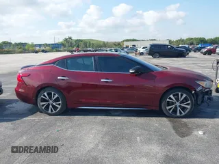 2016 Nissan Maxima SL z VIN 1N4AA6AP2GC402603, wystawiony jako IAAI lot #42132544 z przebiegiem 189 990 mil mil oraz . Historia ofert i sprzedaży dostępna na DreamBid. Obrazek 14.